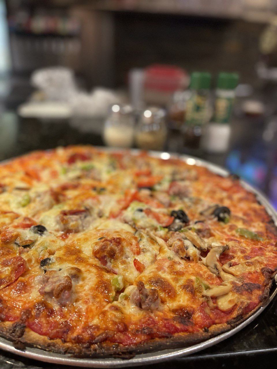 The Guido Special, a thin crust pizza loaded with toppings